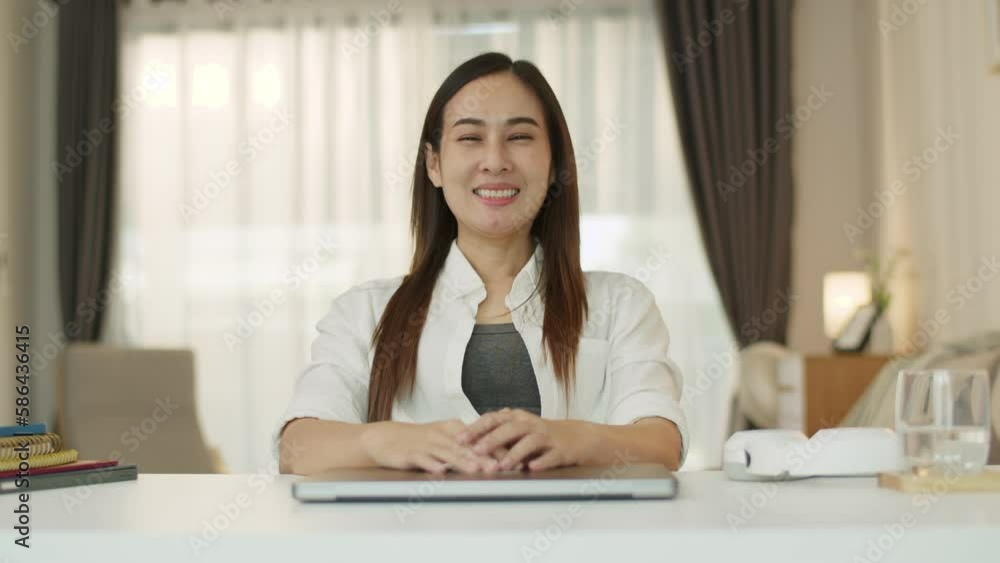 Portrait of beautiful woman video conference with co-worker from home. Portrait of beautiful woman video conference with co-worker from home.