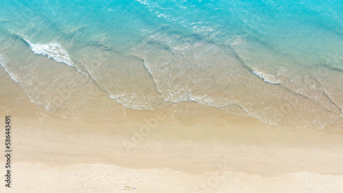 Aerial view with beach in wave of turquoise sea water shot, Top view of beautiful white sand background