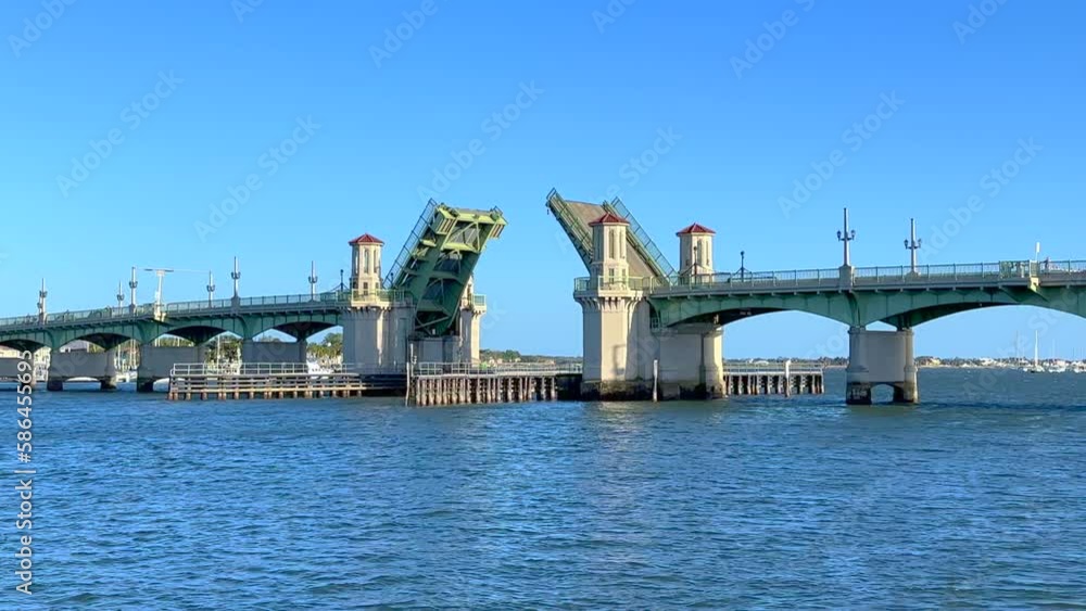 Historic Bridge of Lions drawbridge closing after boat passes through on sunny day, Florida Historic Bridge of Lions drawbridge closing after boat passes through on sunny day, Florida
