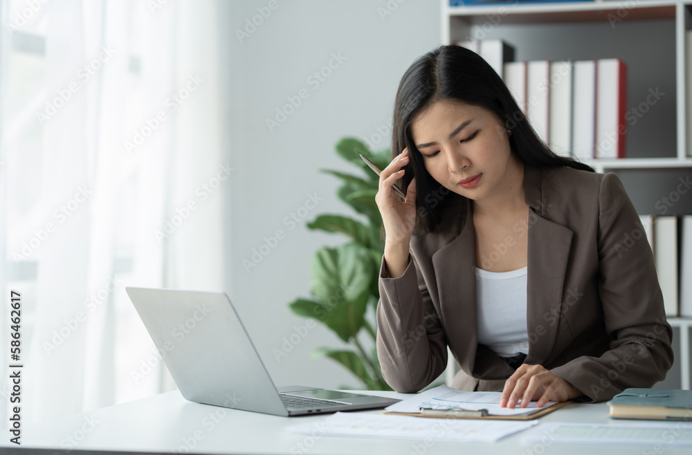 tired business woman sleepy and bored from sitting at a desk for a long time and has office syndrome tired business woman sleepy and bored from sitting at a desk for a long time and has office syndrome