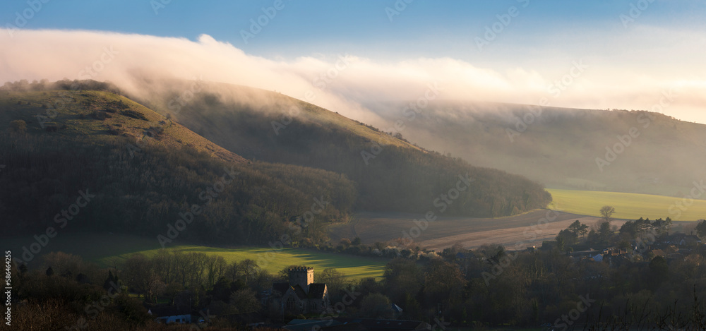 Low cloud and fog rolling in over Devils Dyke and the south downs from Newtimber Hill near Poynings West Sussex south east England UK
