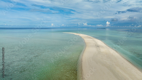 Sandy beach with crystal clear water in the tropics. Timba Timba islet. Tun Sakaran Marine Park. Borneo, Sabah, Malaysia.