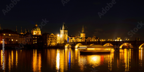 Prague nightscape with the city skyline  landmark buildings  old town towers  and Charles Bridge over the Vltava River Czech Republic