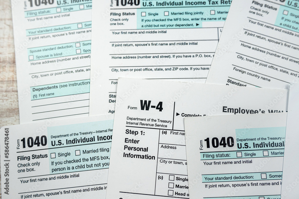 Fototapeta premium closeup of 1040 US personal income tax form on desk