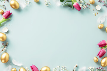 Happy Easter concept with golden easter eggs, feathers and spring flowers. Easter background with copy space. Flat lay