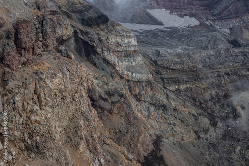 Photos Close-up view of the rocks on the rim and inner slope of the volcanic crater