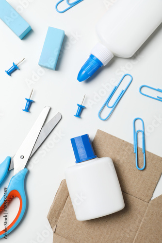 Concept of different office stationery with glue