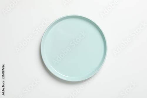 Empty plate on white background, top view
