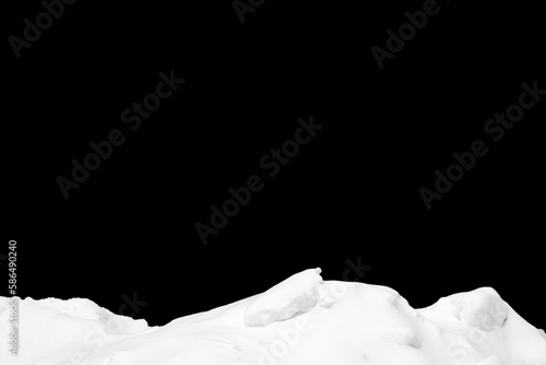 pile of snow isolated on black background © Fotograf