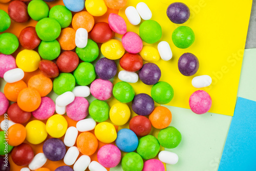 Stampa su tela Skittles candy on the colorful table, colorful sweet candy
