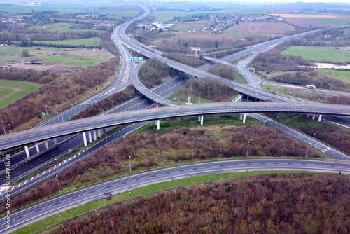 Aerial drone. Empty Darenth interchange leading to Queen Elizabeth II Bridge (Dartford Crossing). Junction between A2 and M25 motorway in Kent. England, UK. photo