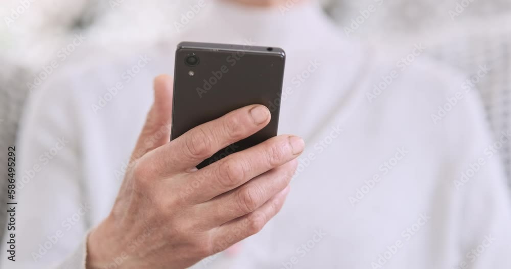 Elderly hands holding smartphone, front view, close-up, copy space. Concept of using new devices by old people, grandmothers, mothers. Elderly hands holding smartphone, front view, close-up, copy space. Concept of using new devices by old people, grandmothers, mothers.