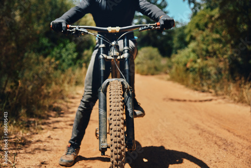 Mountain bike, person on path and fitness outdoor, ready for cycling and extreme sports with biking and exercise. Workout, riding in nature with bicycle and athlete, training for race with cyclist
