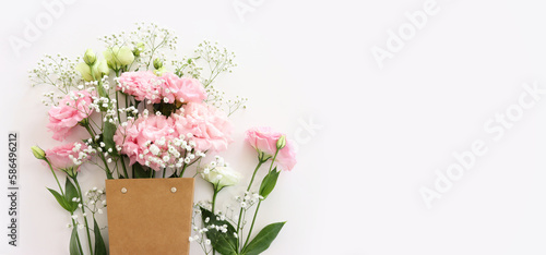 Top view image of delicate beautiful white and pink flowers background