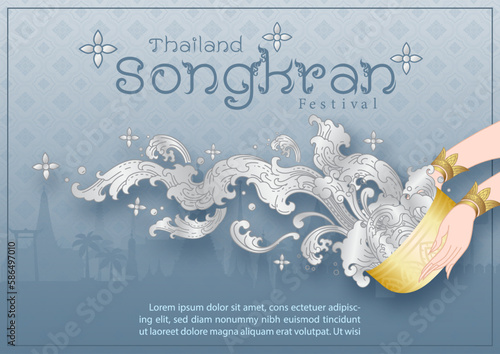 Closeup and crop woman hands holding a golden bowl splashing water in the traditional Thai pattern style with the name of event on gradient blue background. Poster of Thailand Songkran festival.