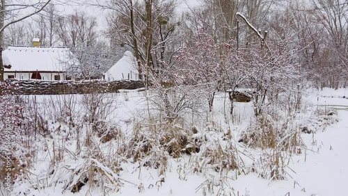 The snowy winter scene, Mamajeva Sloboda Cossack Village, Kyiv, Ukraine photo