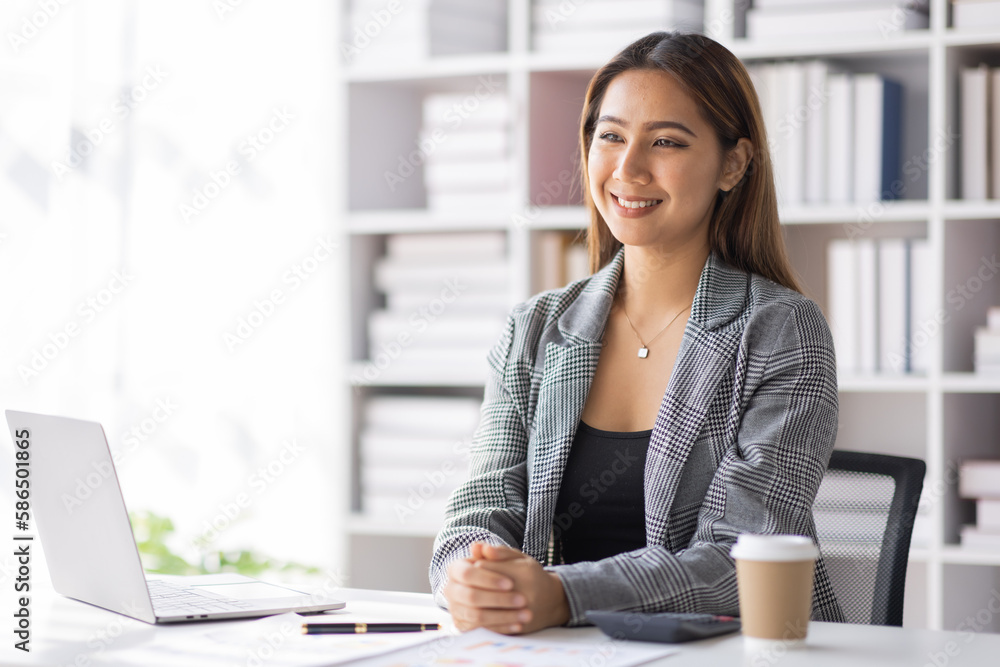 Young asian business woman manager accounting analyst checking bills, analyzing sales statistics management, taxes financial data documents or marketing report papers working in office using laptop.
Y Young asian business woman manager accounting analyst checking bills, analyzing sales statistics management, taxes financial data documents or marketing report papers working in office using laptop.
Y