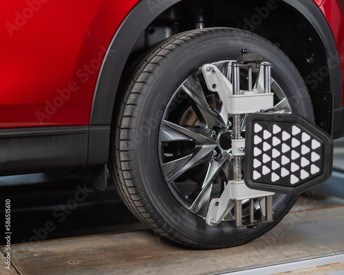 Obraz na płótnie Alignment of car wheels in a car service.