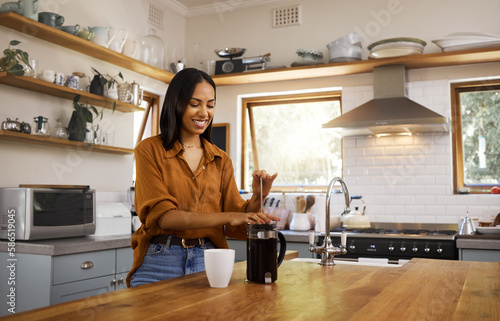 Kitchen, coffee and woman with French press for breakfast latte, cappuccino and hot beverage at home. Relax, morning routine and happy girl make espresso, caffeine drink and brewing in apartment