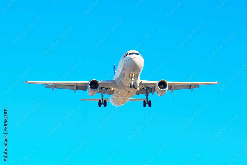 Spotting the Action: A Close-Up of a Plane Descending for Landing