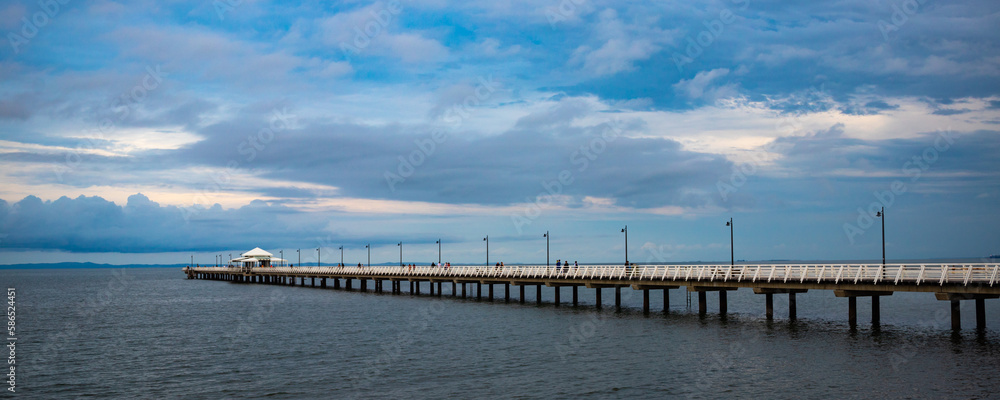 Panoramic view on stunning long Shorncliffe pier in Moreton Bay and horizon, Brisbane suburb, Queensland, Australia