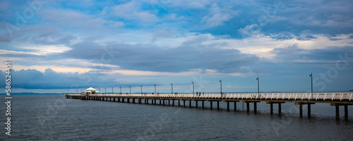 Panoramic view on stunning long Shorncliffe pier in Moreton Bay and horizon  Brisbane suburb  Queensland  Australia