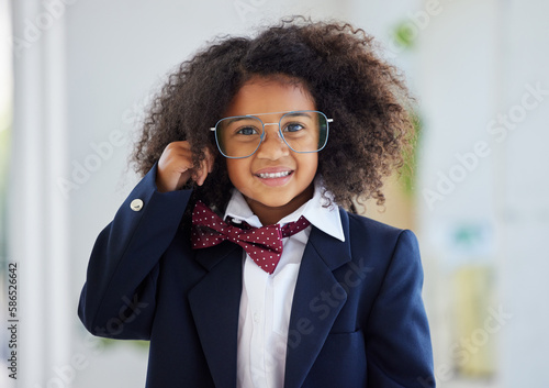 Obraz na plátne Happy, portrait and a child dressed as an employee, playing in the office and having fun with work clothes