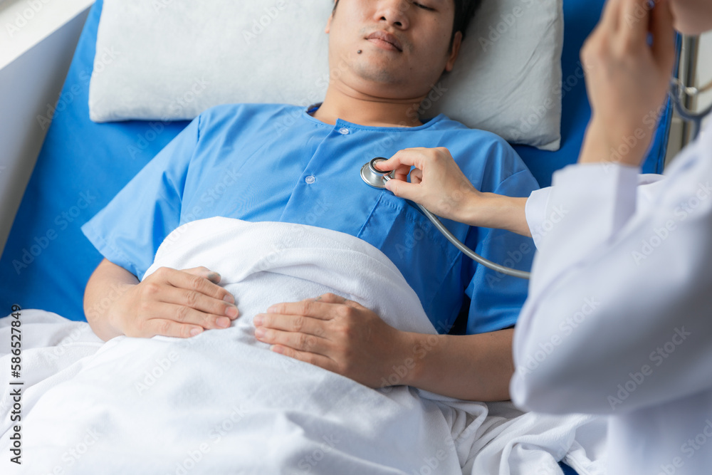 Doctor and male patient in hospital room Doctor and male patient in hospital room