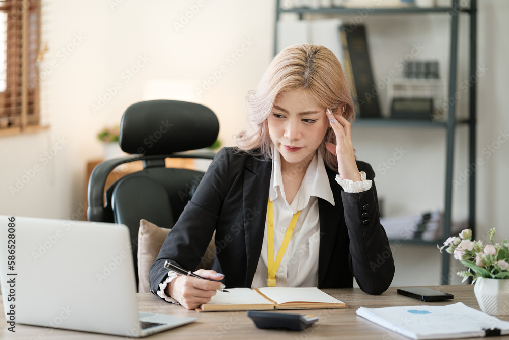 Close up on laptop in office, Asian happy beautiful businesswoman in formal suit work in workplace. Attractive female employee office worker smile. Close up on laptop in office, Asian happy beautiful businesswoman in formal suit work in workplace. Attractive female employee office worker smile.
