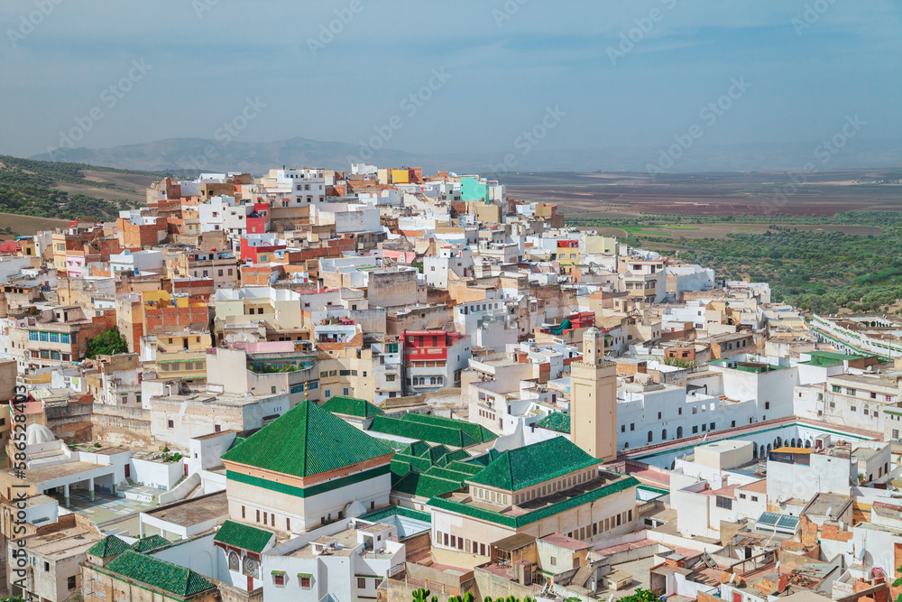 View overlooking the town. Wooden roofs. Morocco
