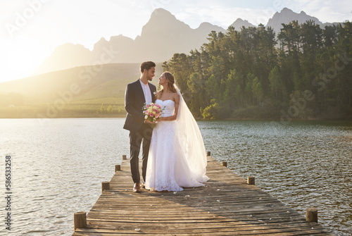 Cuadro en lienzo Love, married or romance with a bride and groom on a pier over a forest lake in nature after their ceremony