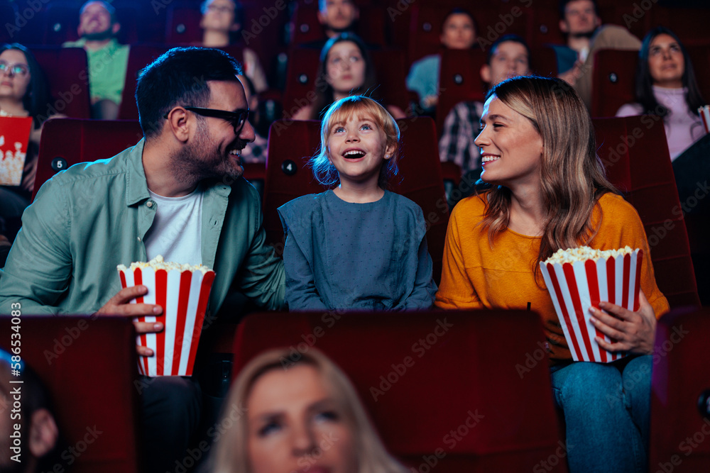 © bernardbodo - Family at movies on weekend. © bernardbodo - Family at movies on weekend.