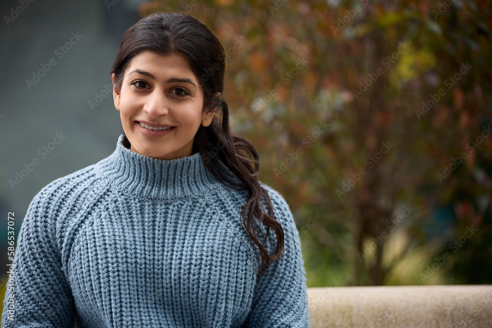 Head And Shoulders Portrait Of Beautiful And Natural South Asian Woman Outdoors Head And Shoulders Portrait Of Beautiful And Natural South Asian Woman Outdoors