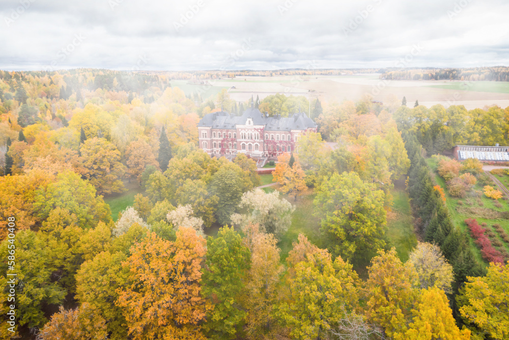 Loviisa, Finland - 7 October 2019: Aerial view of Manor House Malmgard in fog.