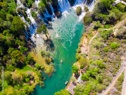 Drone aerial top down view of picturesque Kravice waterfalls in Bosnia Herzegovina. photo