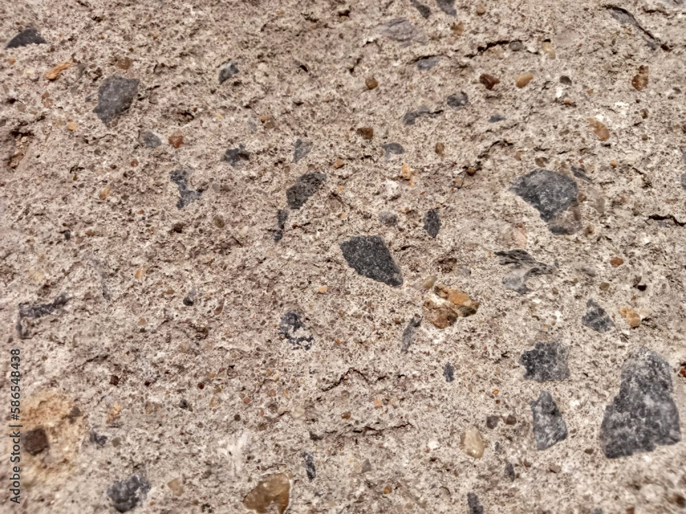 The rugged surface of the old cement walkway has unusual rock outcrops. The rugged surface of the old cement walkway has unusual rock outcrops.