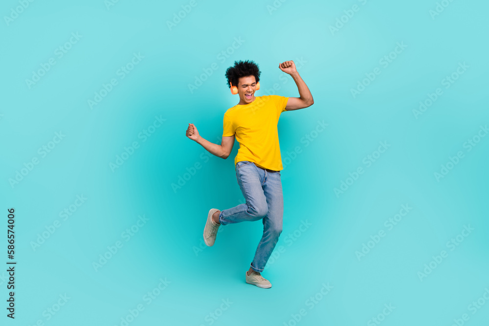 Full body photo of hipster funny guy with chevelure hair listen wireless headphones dancing chill favorite playlist isolated on cyan color background