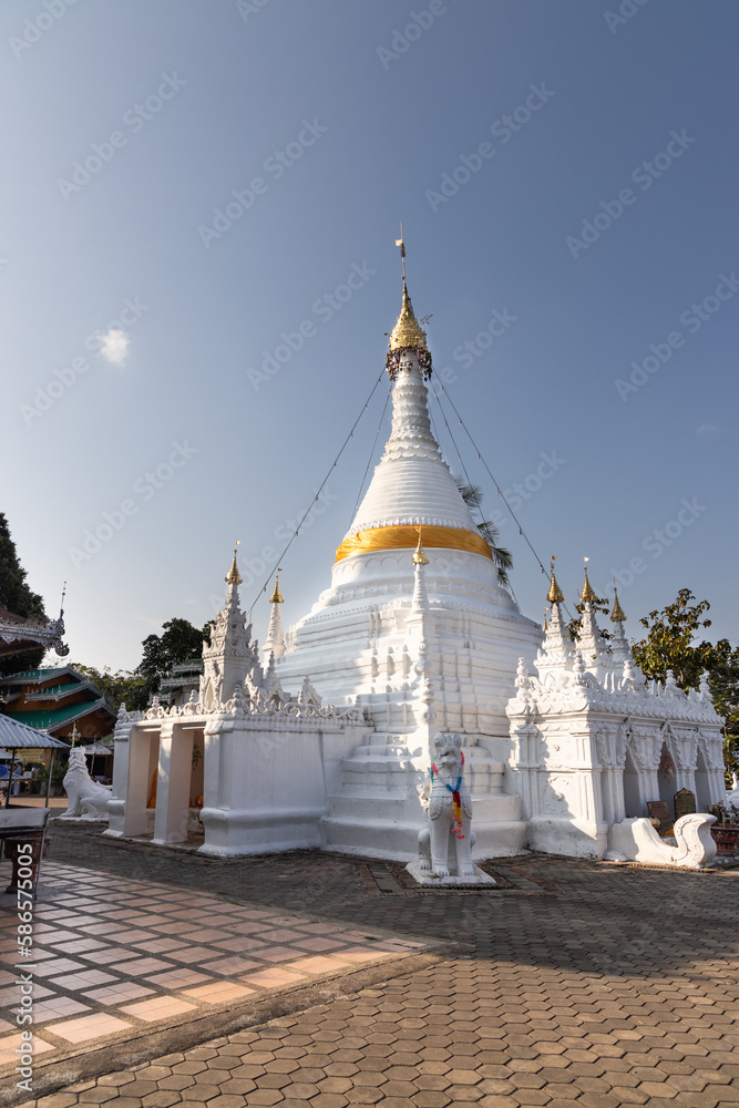 Fototapeta premium Wat Phrathat Doi Kong Mu is an ancient Thai Buddhist temple in Mae Hong Son province, It is located on Doi Kong Mu hill 1,300 m above sea level