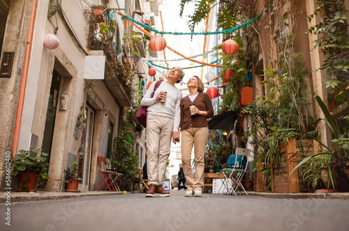 Full Length Shot Of Happy Senior Tourists Couple Walking Outdoors © Prostock-studio
