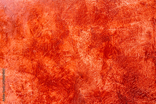 Close up abstract background, white concrete wall which is plastered with red oil paint feels.
