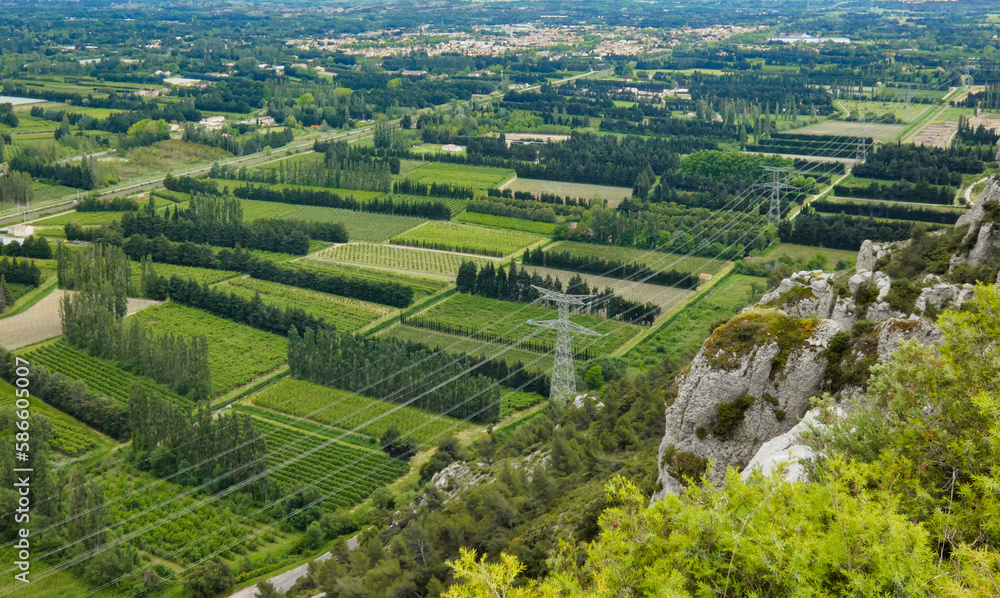 Aerial view of the very many fields spanning the green valley of the Durance near the Alpilles in Provence in France