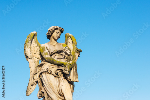 Angel statue on bridge at Castel Sant`Angelo, Rome, Italy