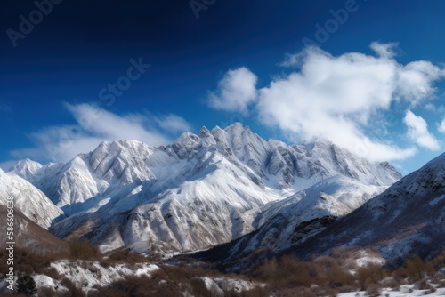 Snow-Covered Mountains and Bright Blue Sky in Panoramic Winter Landscape © Georg Lösch