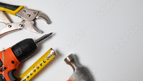 Tools on a white background with space for text. Top view. photo