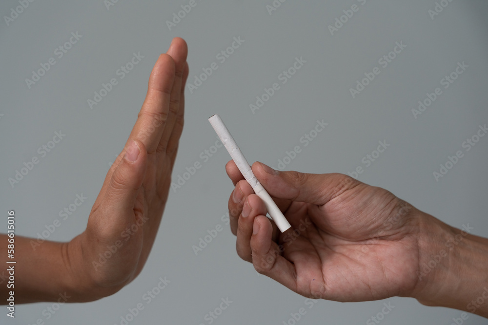 No smoking. Man stop smoke, refuse, reject, break take cigarette, say no. quit smoking for health. world tobacco day. drugs, Lung Cancer, emphysema , Pulmonary disease, narcotic, nicotine effect No smoking. Man stop smoke, refuse, reject, break take cigarette, say no. quit smoking for health. world tobacco day. drugs, Lung Cancer, emphysema , Pulmonary disease, narcotic, nicotine effect