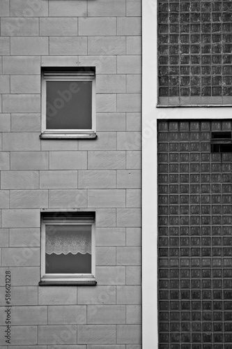 Vertical grayscale shot of dreary architecture in Essen, Germany