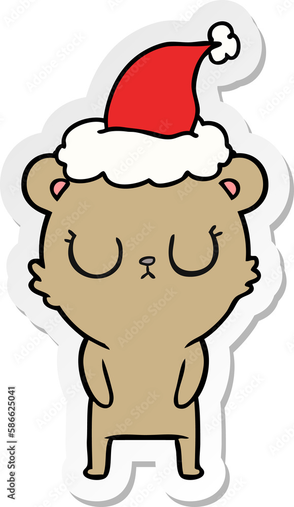 Fototapeta premium peaceful sticker cartoon of a bear wearing santa hat