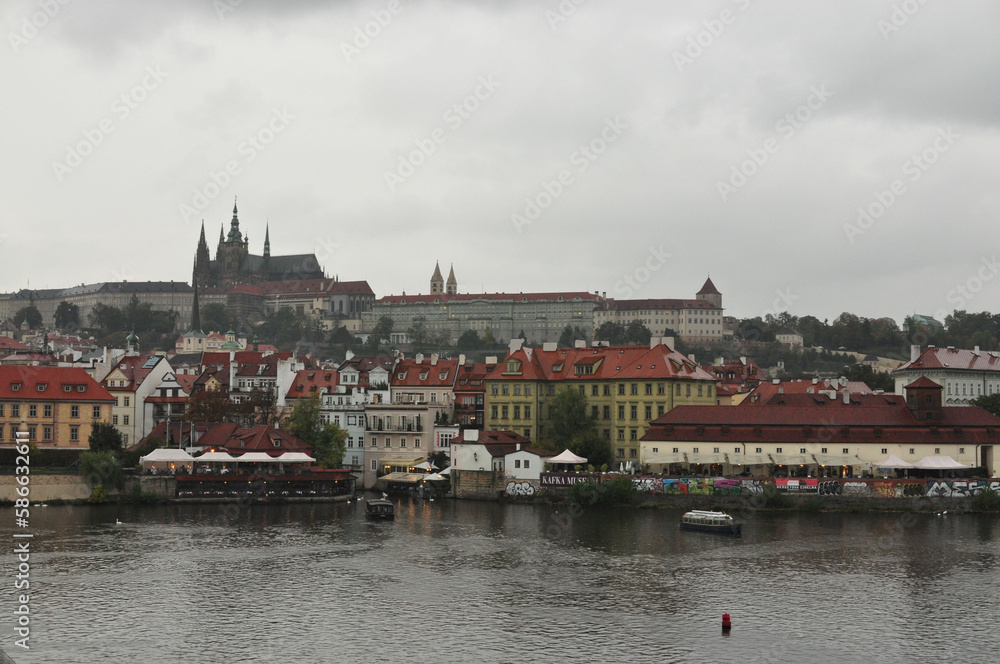 View of the Vltava River and Charles Bridge in the rain. Prague, Czech Republic