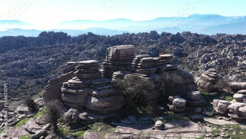 Impressive Mountain top rocks in Torcal de Antequera seen from above, aerial drone view of karstik rocks in Spain photo