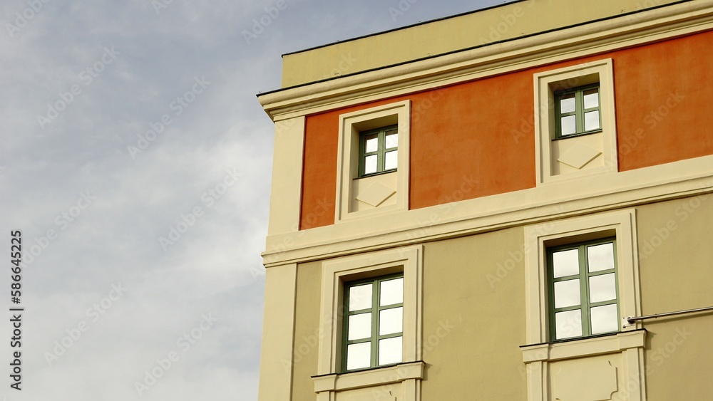 classic building facade with windows against the sky classic building facade with windows against the sky